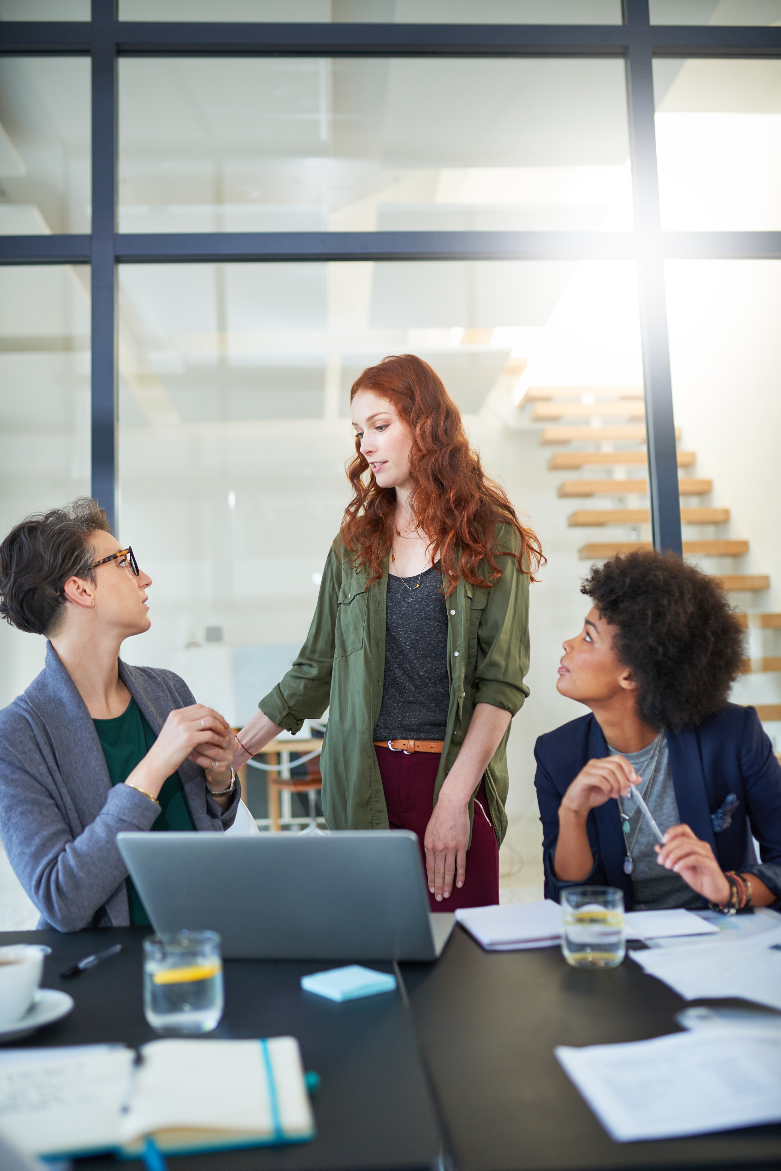 Women presenting and collaborating